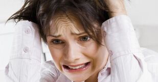 The onset of pain in a woman due to stress